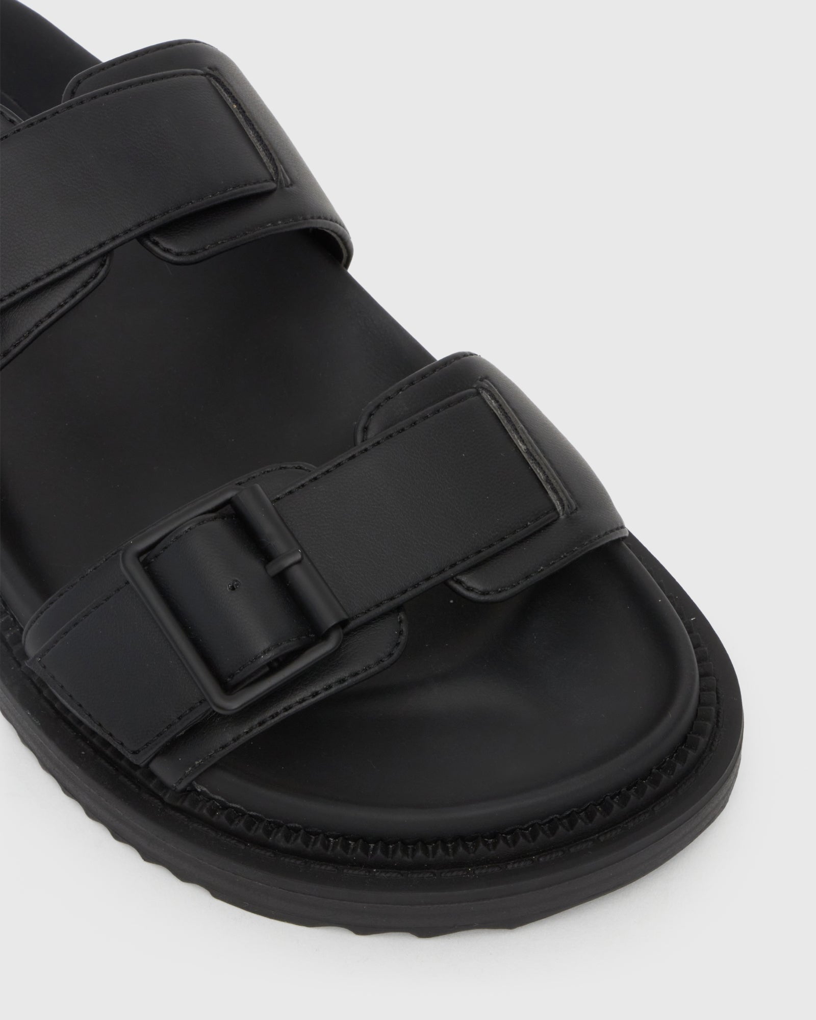 Buy MIDTOWN Feature Buckle Footbed Slides by Betts online Betts